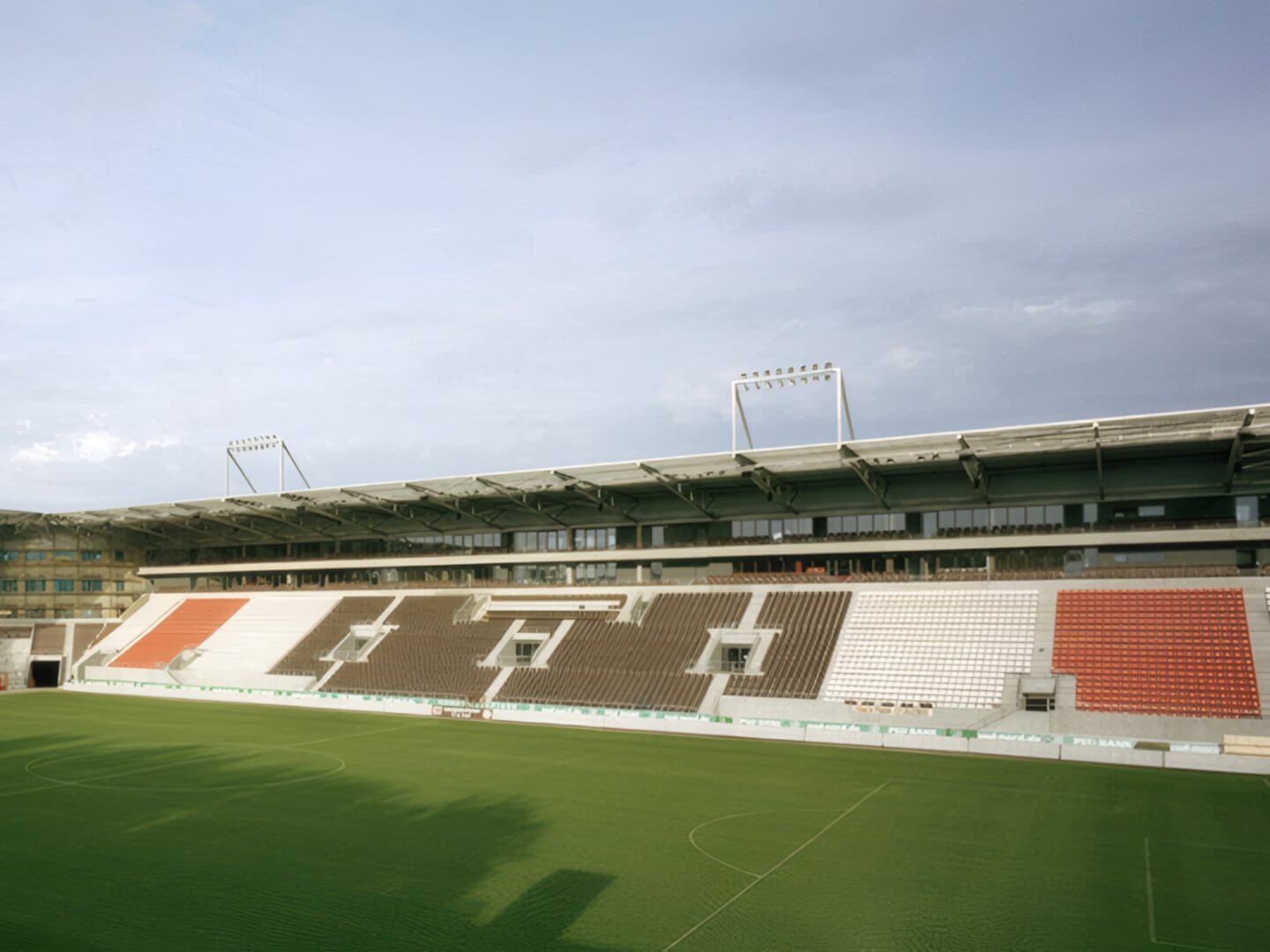 Das Millerntor-Stadion in Hamburg präsentiert sich als erfolgreiches Bauprojekt der Hellmich Gruppe, das moderne Stadionarchitektur mit funktionalem Design verbindet.
